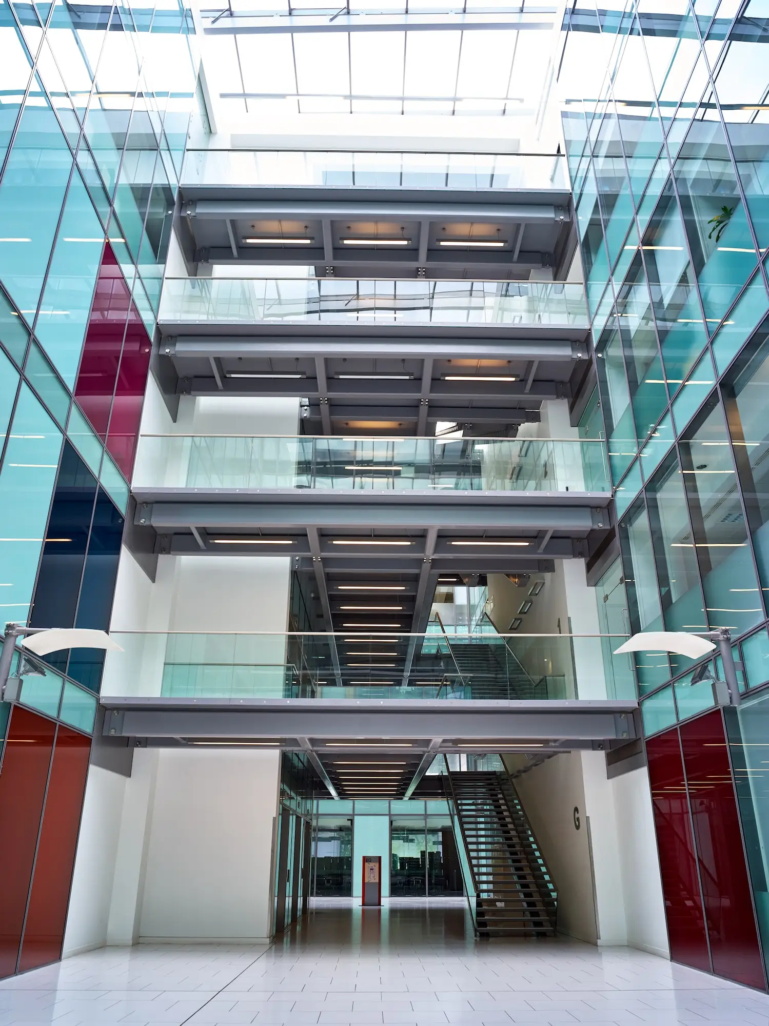 interior view from modern office lobby of empty floors and staircases Lambert McCormack Property Ltd